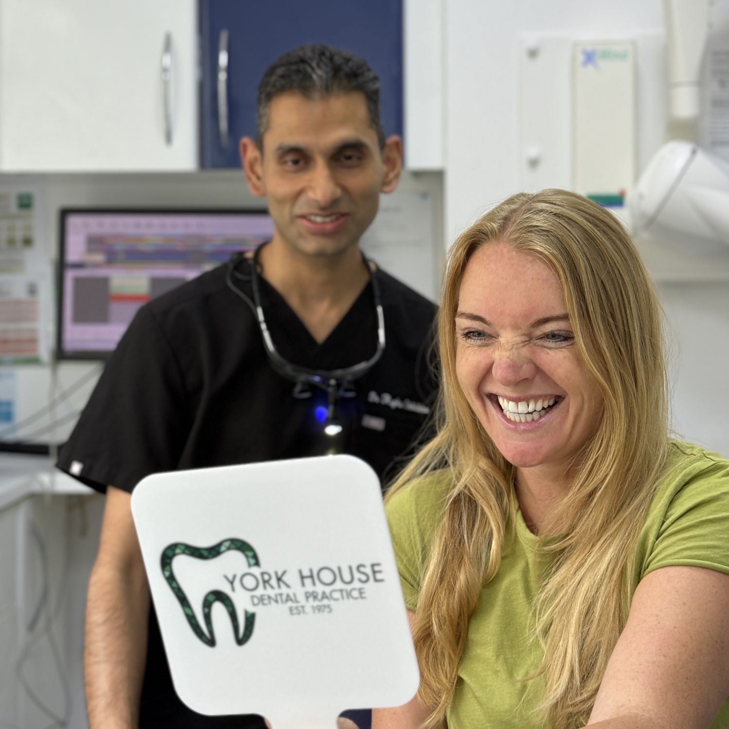 Patient smiling confidently after a smile makeover treatment
